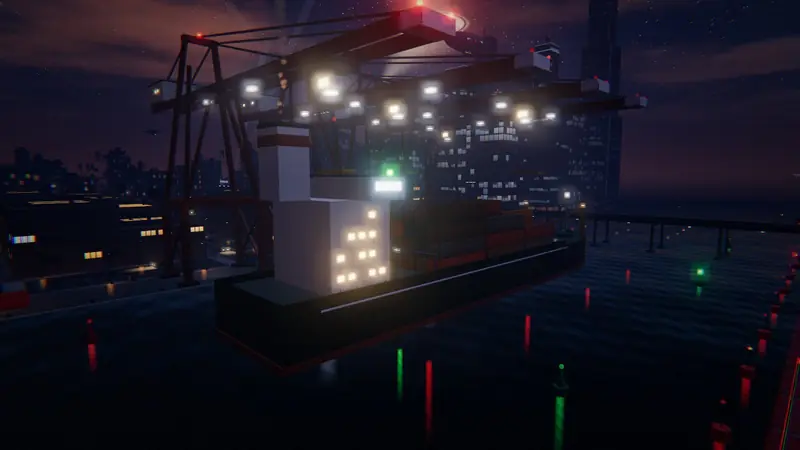 The freighter and gantry cranes of Ironworks Harbor at night